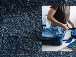 Une couturière travaille sur une toile de denim avec des ciseaux.