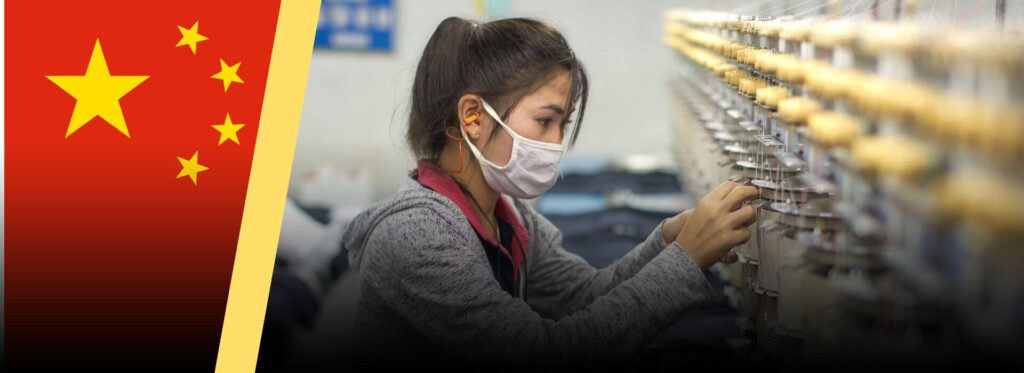 Une ouvriere chinoise dans une usine textile