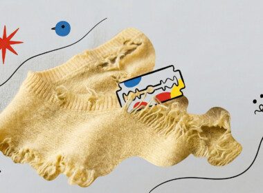 pull-en-cachemire-jaune-décousu-par-une-lame-de-rasoir