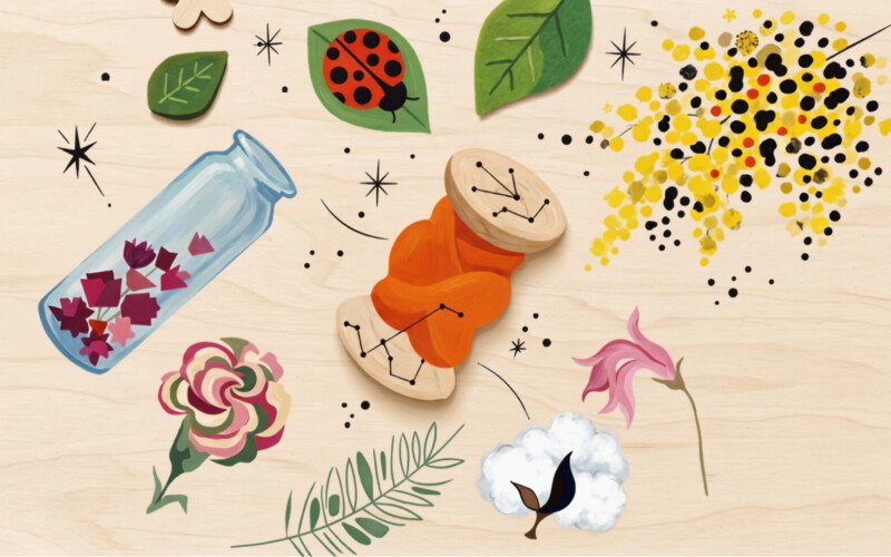 illustration-d-une-bobine-de-fil-orange-sur-une-table